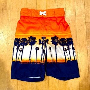 Boys Swim shorts. Cat & Jack. Size 6/7. Excellent condition. Palm Trees. Sunset